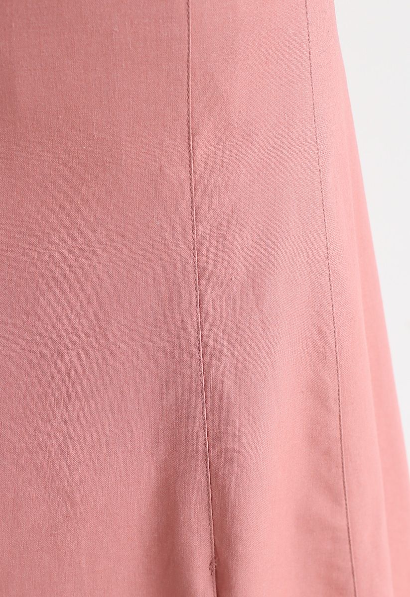 Falda tubo con bajo asimétrico en rosa